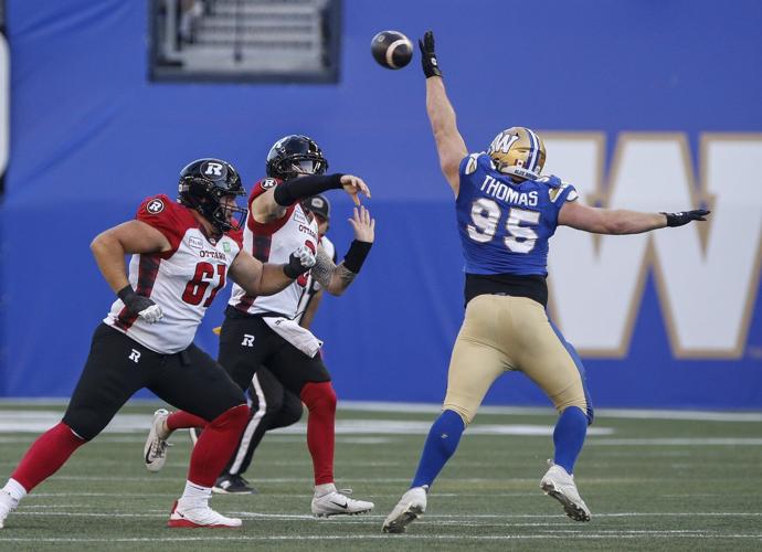Blue Bombers veteran Jake Thomas trades cleats for clipboard in new coaching role