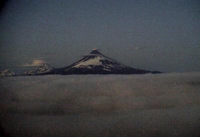 Alaska volcano's weeklong eruption eases after spewing another massive ash cloud