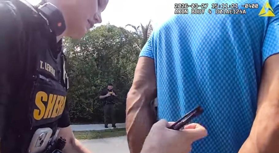 Bodycam shows a stunned Tiger Woods handcuffed after a Florida rollover crash