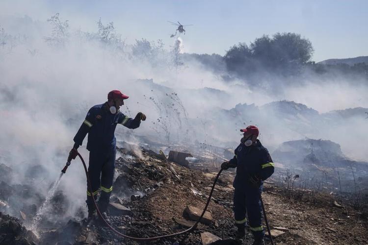 A wildfire on the fringes of the Greek capital triggers evacuation alerts
