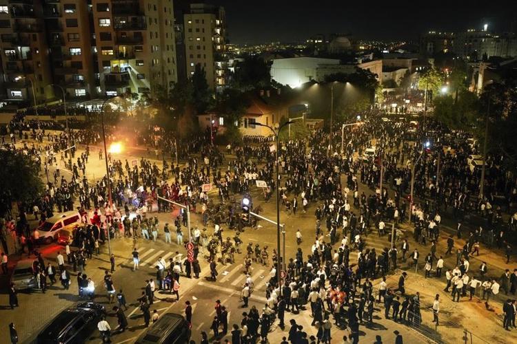 Israeli military says it will begin drafting ultra-Orthodox men. That could rattle the government