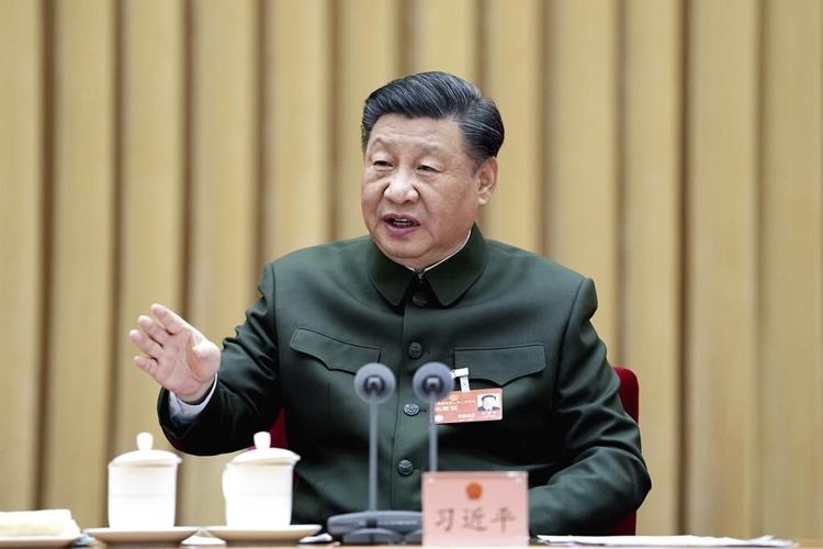 China's Xi calls for 'more quickly elevating' armed forces