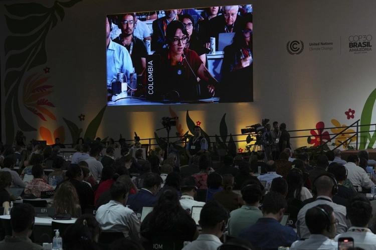 UN climate deal increases money to countries hit by climate change, but no explicit fossil fuel plan