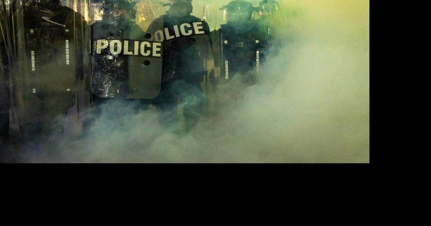 New Jersey police sergeant charged with stealing journalist's camera bag at immigration protest