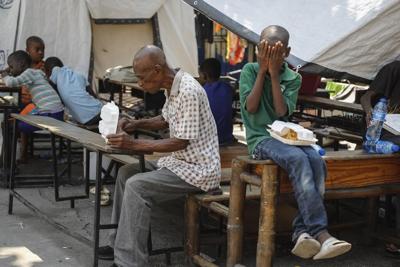 Hunger soars and aid dwindles as gangs in Haiti suffocate the country