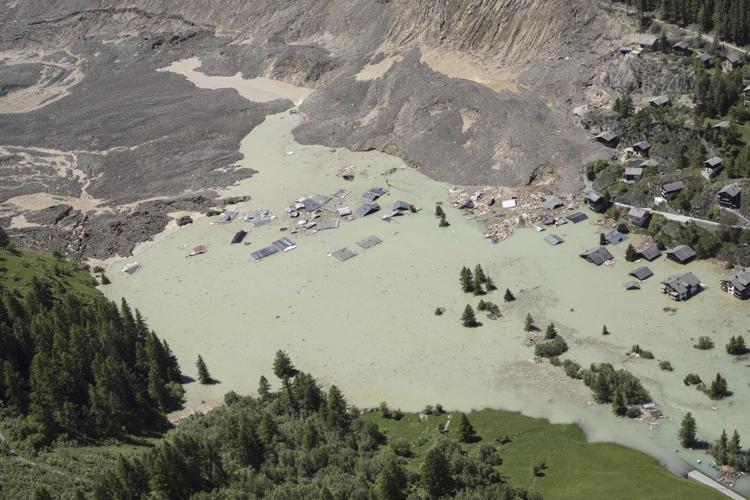 Swiss president pledges aid for Alpine villagers left homeless after glacier collapse