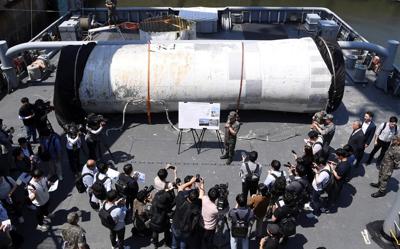Seoul warns North Korea not to launch spy satellite and hints 2018 military deal could be suspended