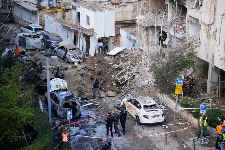 Iran targets Israel and Gulf Arab states even as Trump says US is in talks to end the war