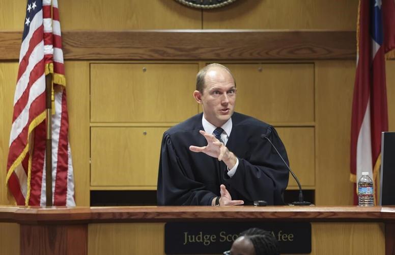 Trump won't be tried with Powell and Chesebro next month in Georgia election case, judge rules