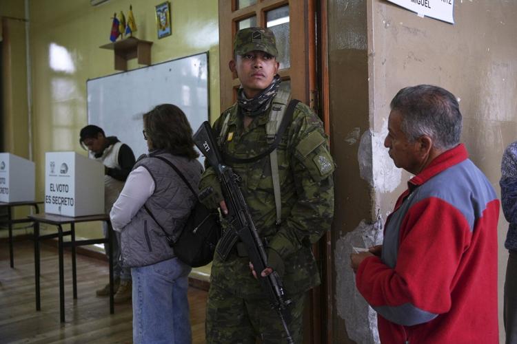 Ecuador votes for president, with the conservative incumbent and a leftist lawyer in the lead