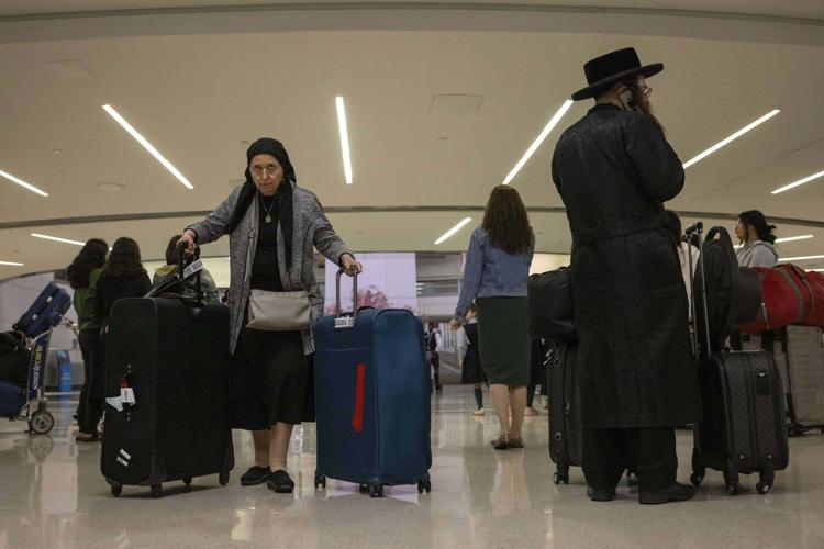 Trump's new travel ban takes effect as tensions escalate over immigration enforcement