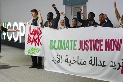 At UN climate talks, some see wars complicating negotiators' task
