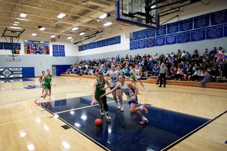 Even in Caitlin Clark's home state, girls high school basketball in decline. It thrives in this town