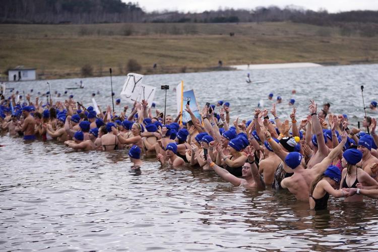 Cold-water swimmers in the Czech Republic set a new world record for the largest polar bear dip