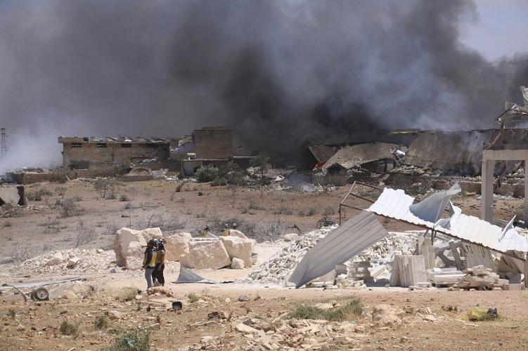 An ammunition depot explosion in Syria kills at least 7 people and injures scores