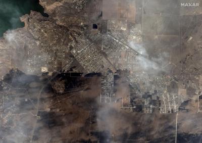 Charred homes, blackened earth after Texas town revisited by destructive wildfire 10 years later