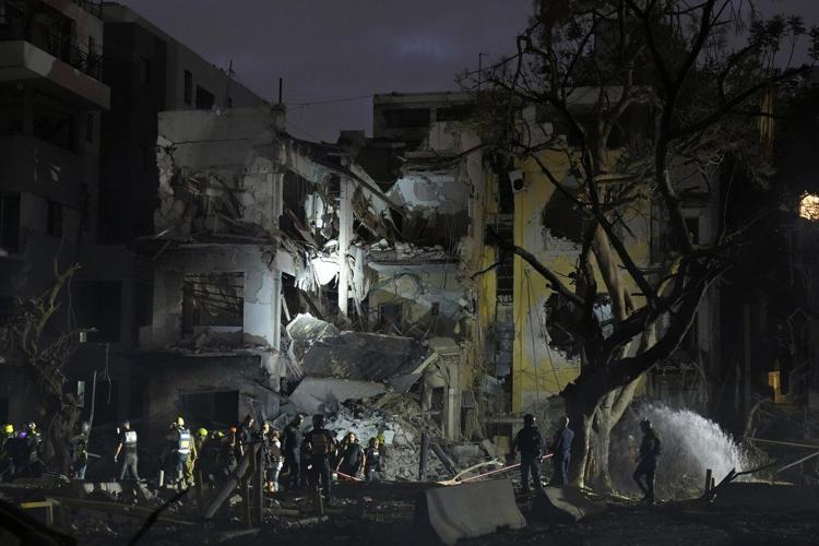 The Latest: Iran launches a new wave of missile attacks on Israel as conflict enters fourth day