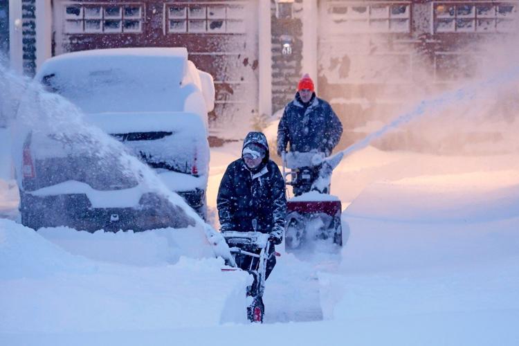 The Latest: Northeast snowstorm forces millions to stay home, disrupts flights and closes schools