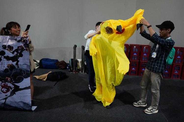 Protesters in Pikachu costumes demand Japan end fossil fuel financing at UN climate conference