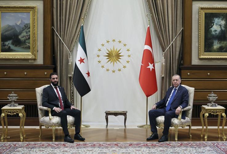 Syria's interim leader holds talks with key ally Turkey on his second international trip