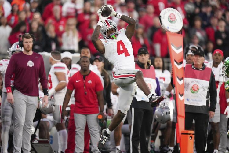 No. 6 Ohio State blasts top-ranked Oregon 41-21 in the Rose Bowl, advances to CFP semifinals