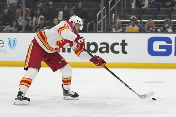 Kempe strikes in OT, Kings top Flames after giving away lead