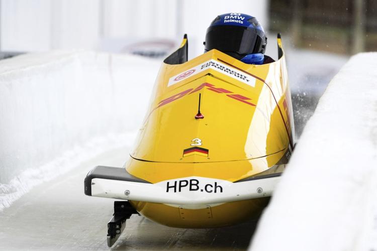 Germans hold 1-2-3 spots midway through 2-man world bobsled championship, with US in medal hunt