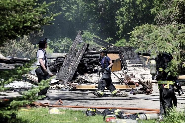 Wisconsin house explosion kills 2 and authorities say reported gunfire was likely ignited ammunition