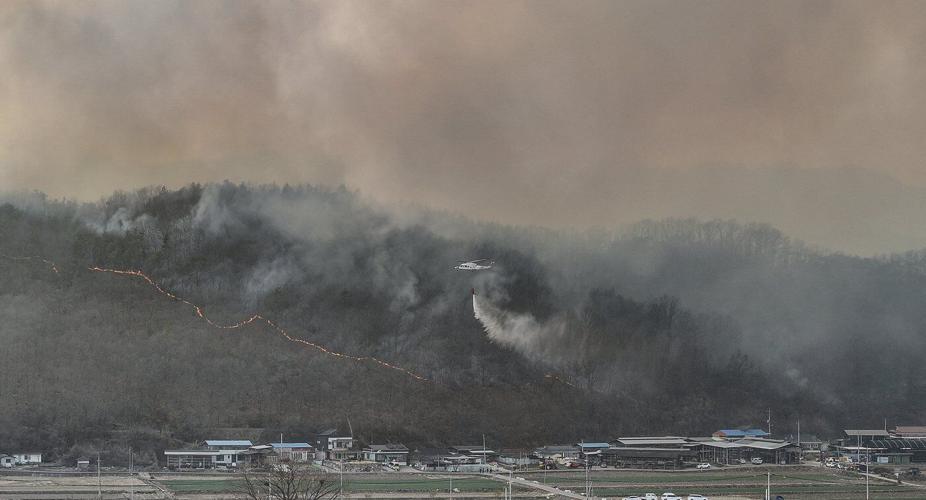 2 firefighters die in South Korea as dry winds fuel dozens of wildfires