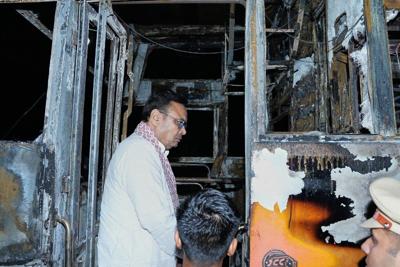 A passenger bus in northern India catches fire and burns at least 20 people to death