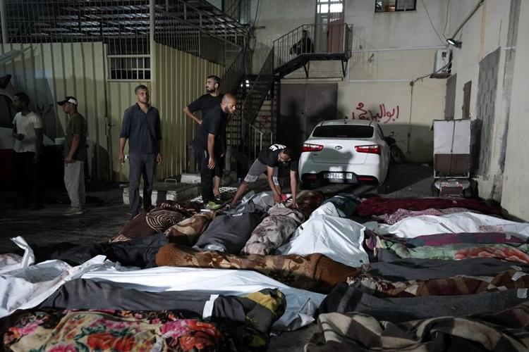 The Latest | Israeli strikes kill at least 18 in central Gaza a day after attack on UN-run school