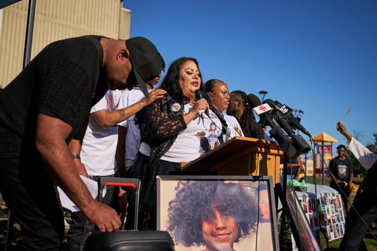 Mother of Toronto boy killed by stray bullet urges vigil crowd not to forget her son