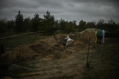 Bodies exhumed from mass grave in Ukraine's liberated Lyman
