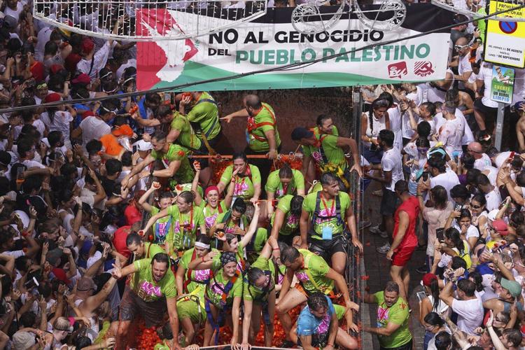 Tons of overripe tomatoes become projectiles in Spain's ‘Tomatina’ food fight