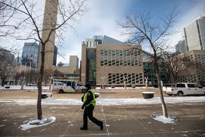 Man charged after Edmonton City Hall shooting, police investigating link to video