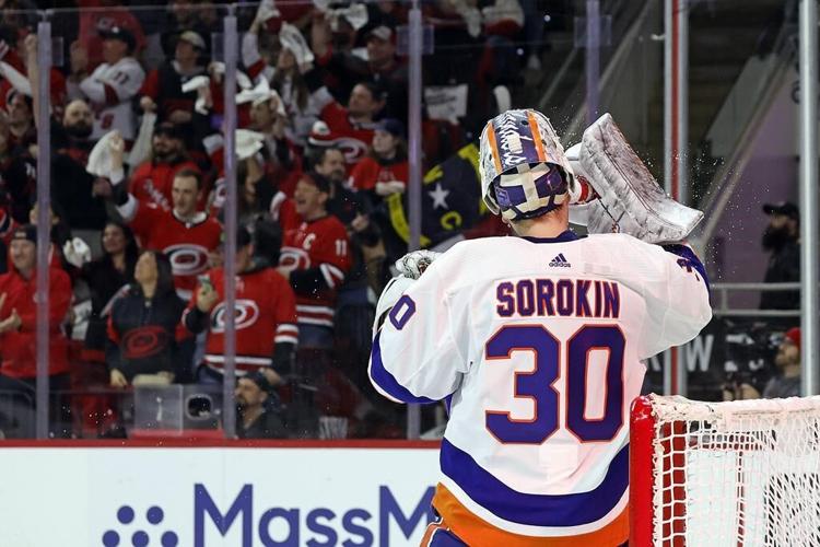 Hurricanes hold on to beat Islanders 2-1 in playoff opener