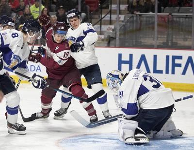 Nyman has goal and assist as Finland blanks Latvia 3-0 at world juniors