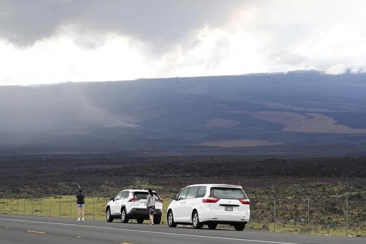 Hawaii volcano eruption has some on alert, draws onlookers