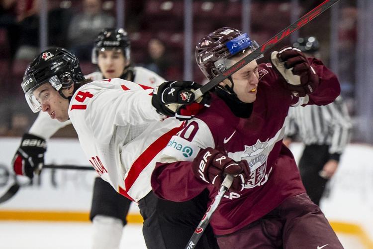 Hage scores in OT, Canada squeaks by Latvia 2-1 at world junior hockey championship