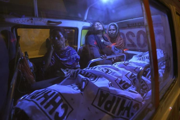 Pakistani police arrest 8 after deadly Ramadan food stampede