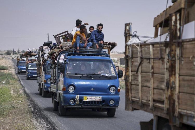 AP PHOTOS: Displaced Syrians Return Home