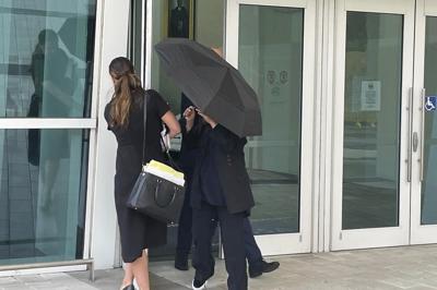 Celebrity handbag designer sentenced to 18 months in prison for smuggling crocodile handbags