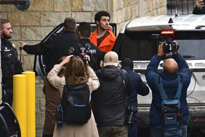 Suspect charged with killing UnitedHealthcare's CEO as an act of terrorism