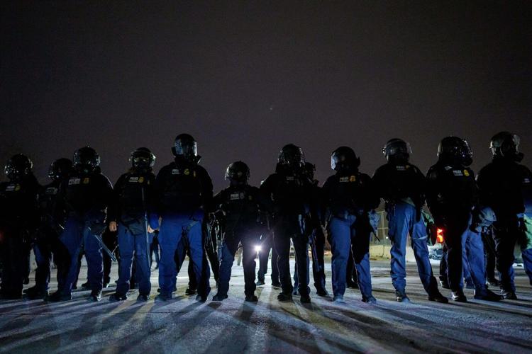 Photos of tensions between federal officers and locals in Minneapolis