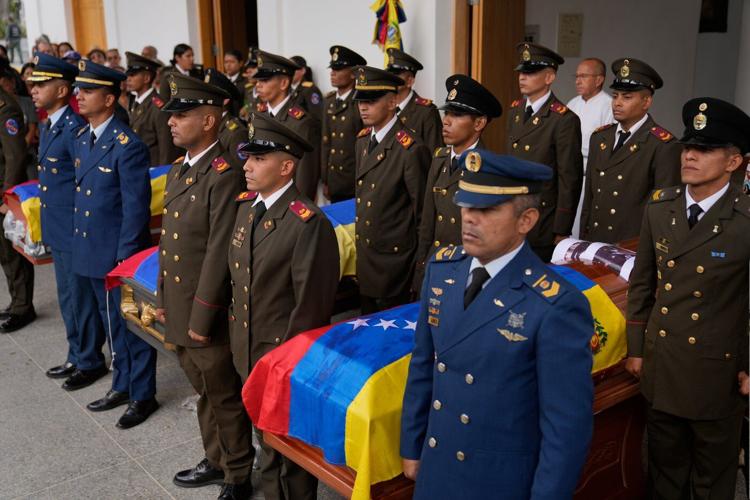 Photos show Venezuelans mourning loved ones killed during US operation to capture Nicolás Maduro