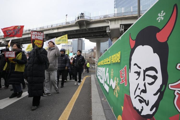 A look at the growing political storm unleashed by South Korean president's martial law decree