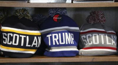 Trump's trip to Scotland as his new golf course opens blurs politics and the family's business