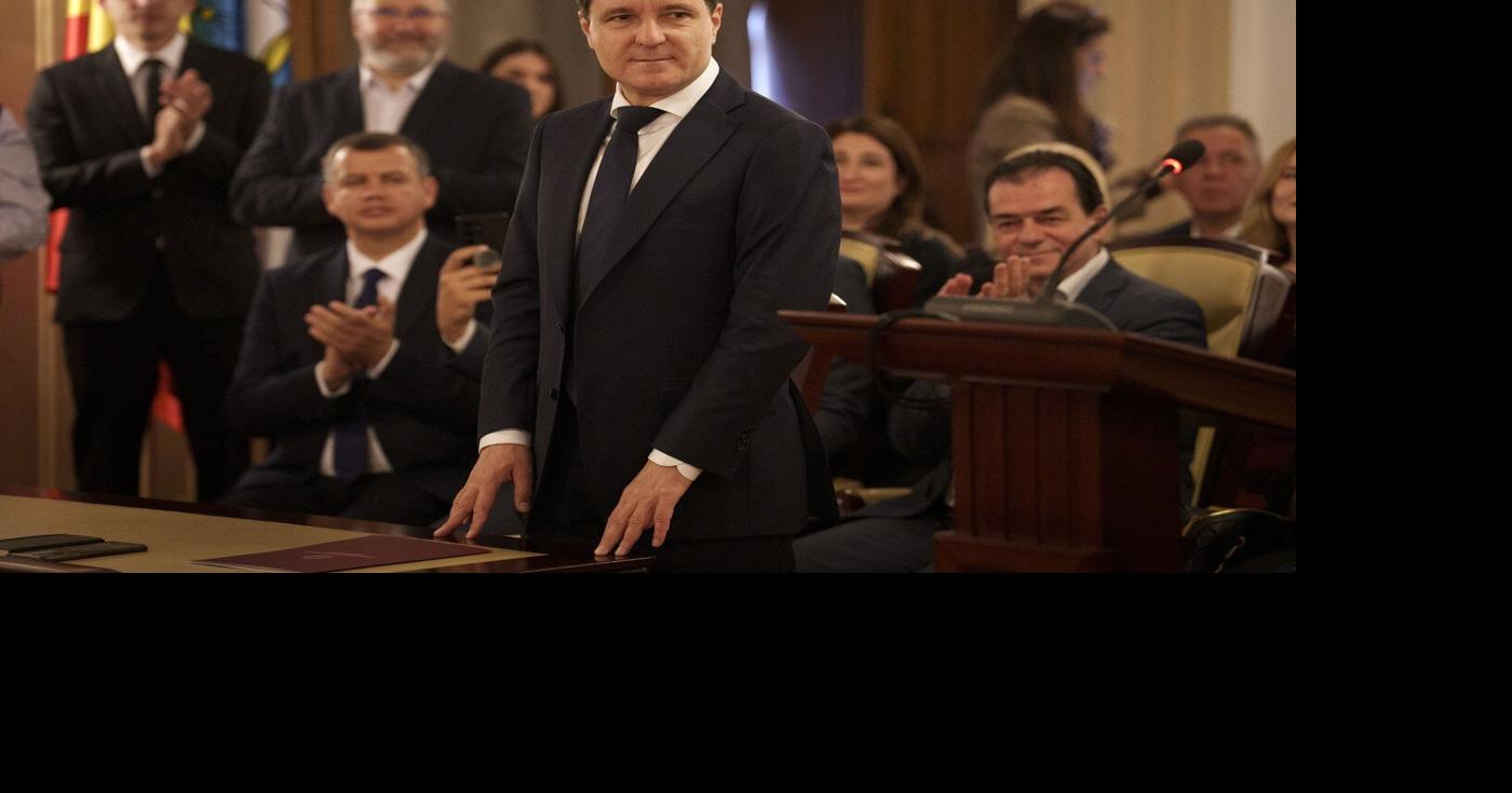 Romania's new president is sworn in as a political crisis eases, but ...