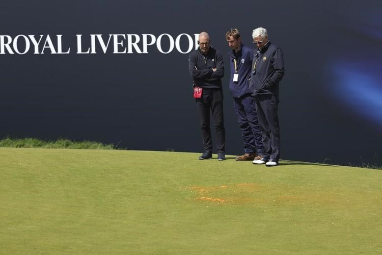 Environmental activists disrupt play at British Open by throwing orange substance on 17th green