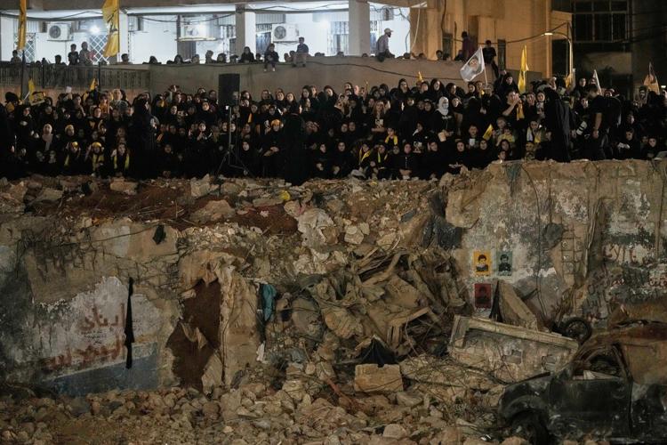 Photos show Hezbollah supporters honoring slain leaders Nasrallah and Safieddine despite PM's ban